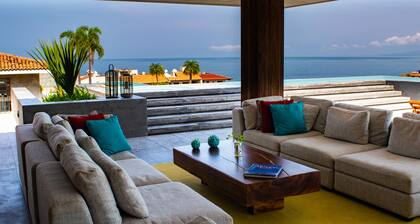 Nouveau condo 2 BR, 5 min de la plage. Une vue imprenable sur l'océan depuis le toit avec piscine!