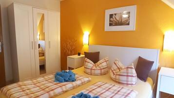 2 slaapkamers, een strijkplank/strijkijzer, reisbedje, gratis wifi