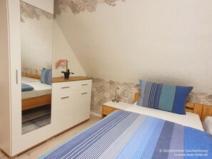 2 室のベッドルーム、WiFi (無料)、ベッドシーツ