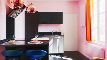 Fridge, microwave, coffee/tea maker, toaster