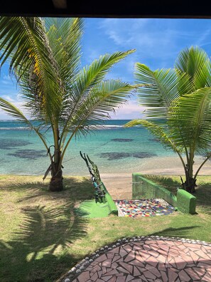 On the beach, sun-loungers, beach towels