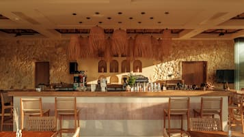 2 bars/lounges, poolside bar, beach bar