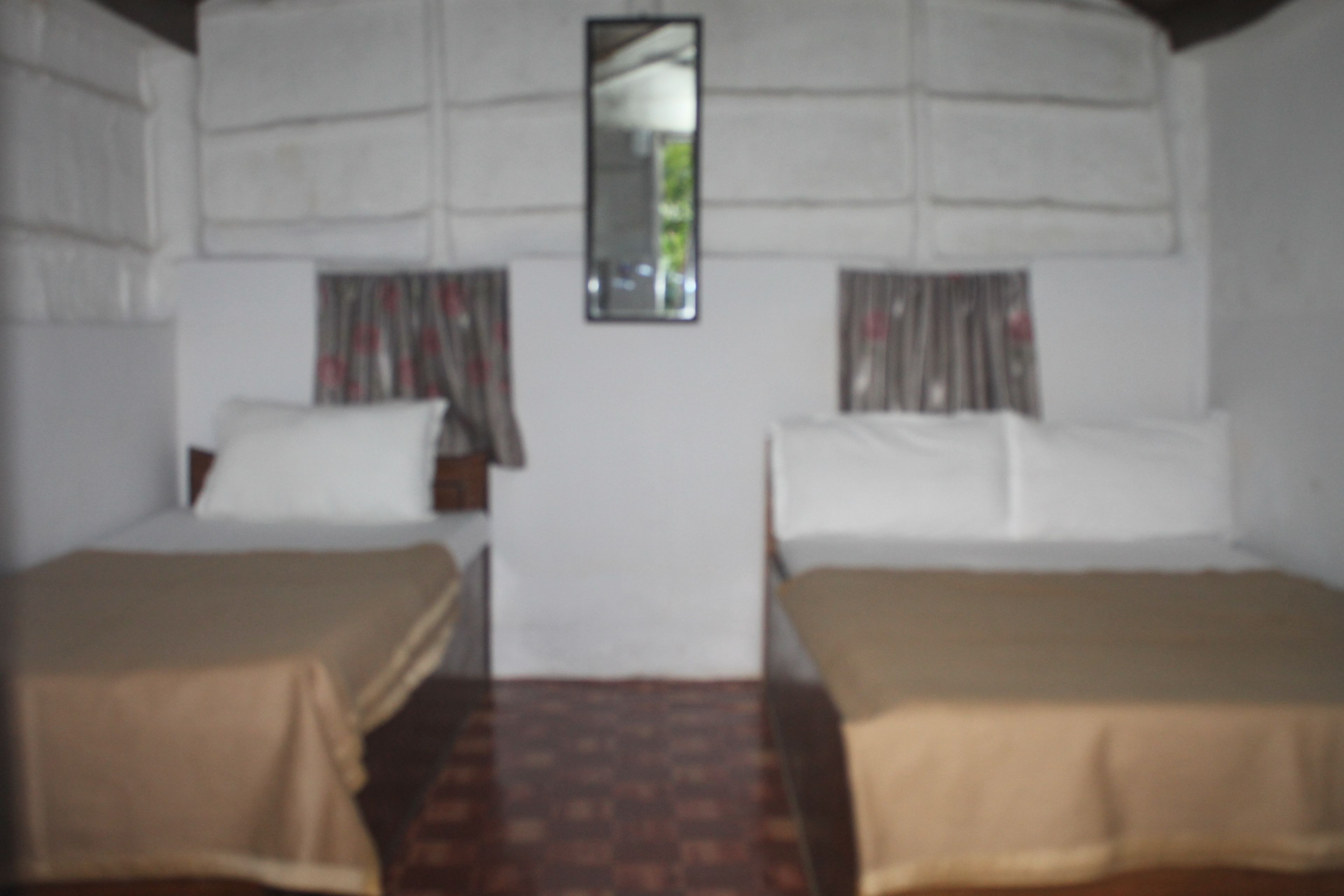 Comfort Cottage, 2 Twin Beds, Smoking | In-room safe, blackout drapes, iron/ironing board, free WiFi