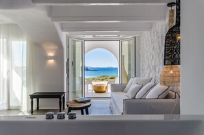 Living area - Cyano Suites offers views over the Aegean Sea and the Temple of Apollo. (Naxos)