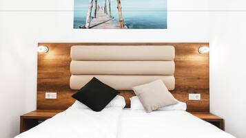 Standaard tweepersoonskamer | Een bureau, geluiddichte muren, gratis wifi, beddengoed