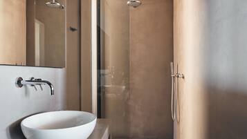 Shower, designer toiletries, hair dryer, bathrobes