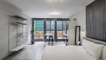 Luxury Suite | Cortinas blackout, tabla de planchar con plancha y wifi gratis