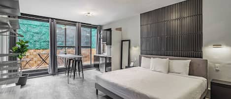 Luxury Suite | Cortinas blackout, tabla de planchar con plancha y wifi gratis