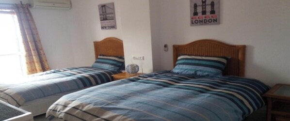 3 quartos, ferros/tábuas de passar roupa, Wi-Fi, roupa de cama