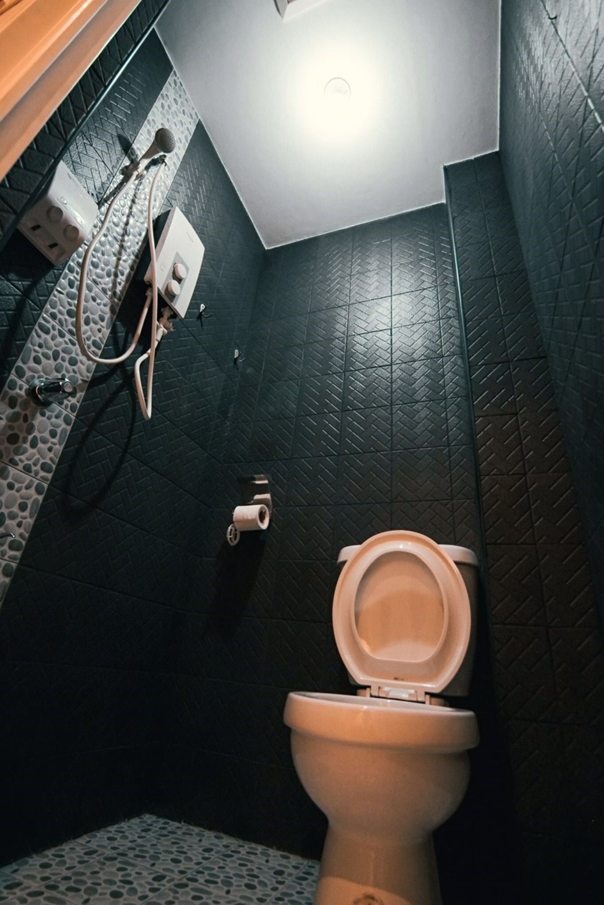 deluxe studio suite | bathroom | shower, free toiletries, slippers, bidet