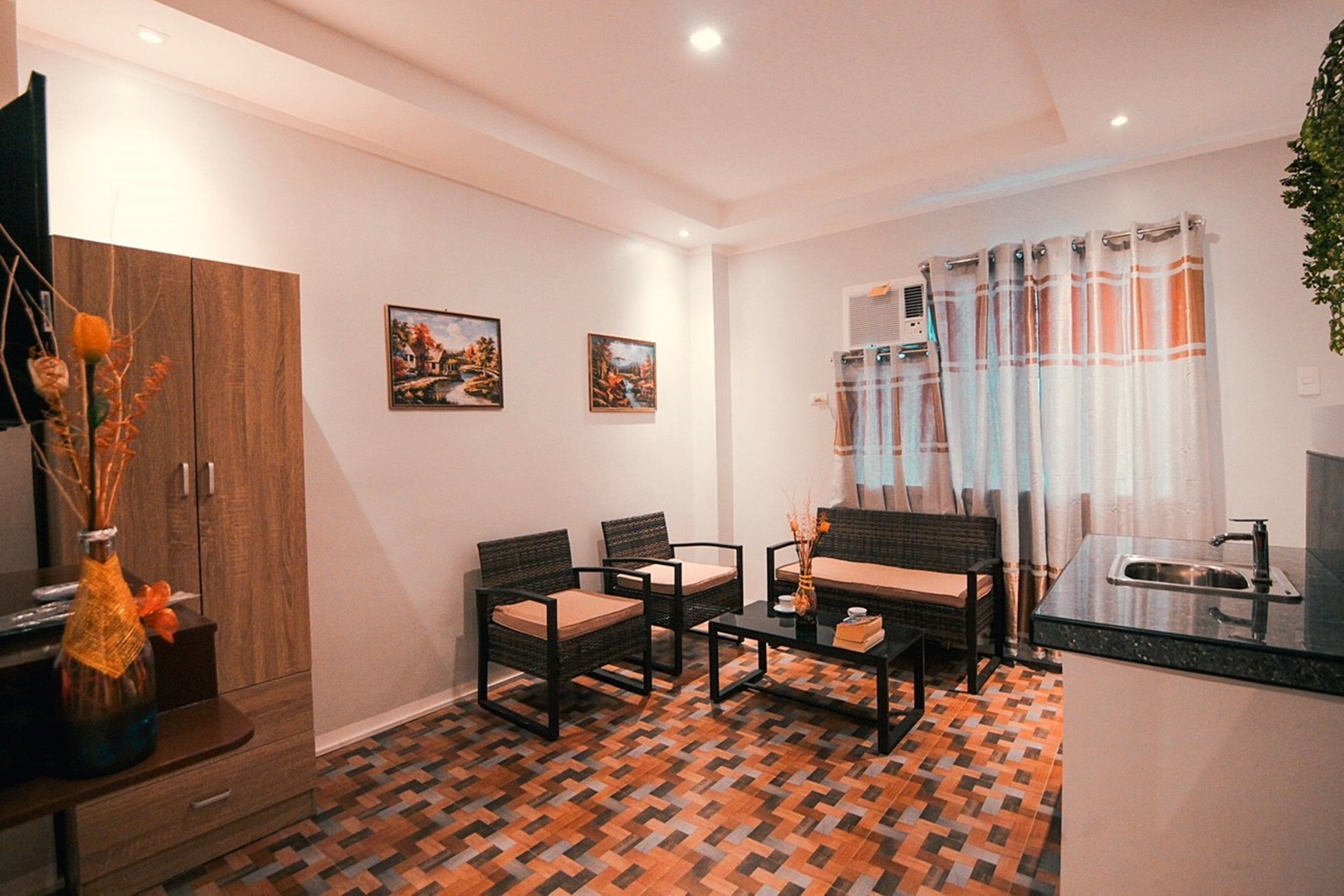 deluxe studio suite | living room | led tv