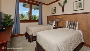 A hotel room with two beds, a desk, and a window with curtains. - Exceptional 5-stars Beach Villas at Ko Olina - 3 Bedrooms & 3 Full Bathrooms (Ko Olina)