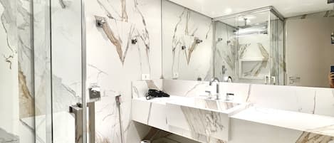 Shower, hair dryer, towels, soap
