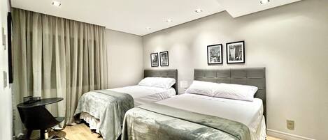 2 quartos, escrivaninha, ferros/tábuas de passar roupa