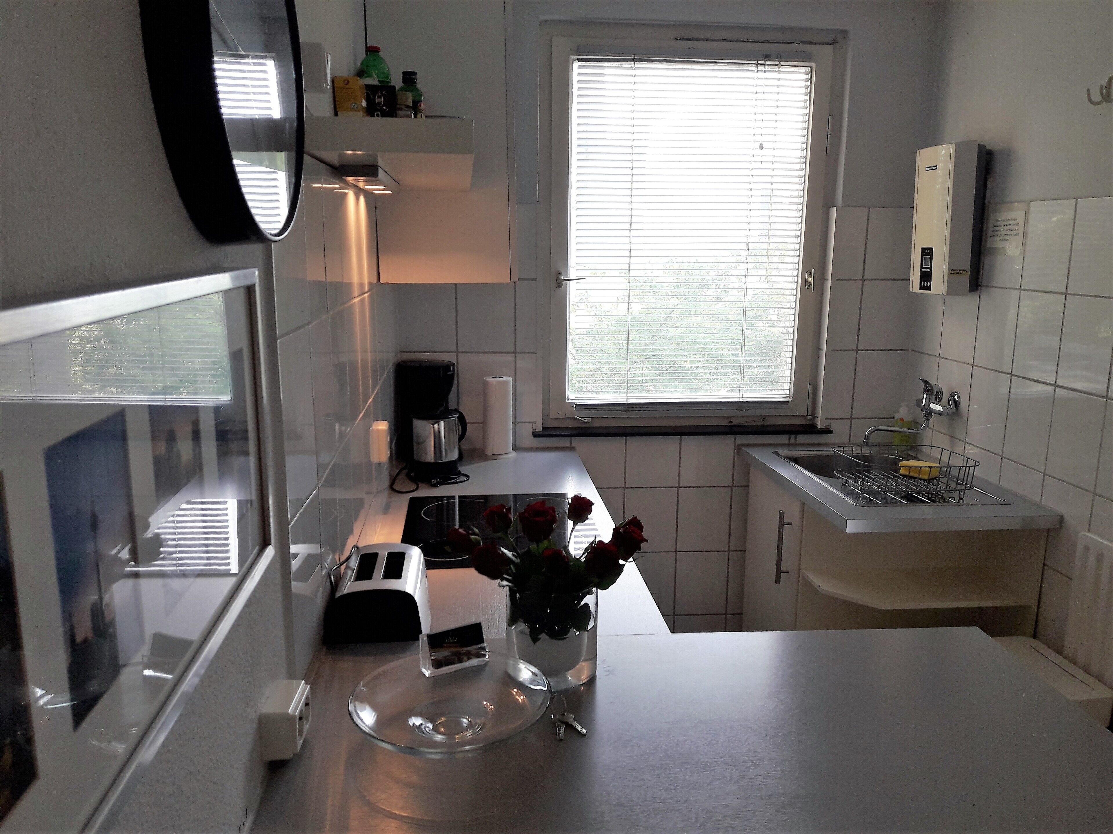 Réfrigérateur, four, plaque de cuisson, cafetière/bouilloire