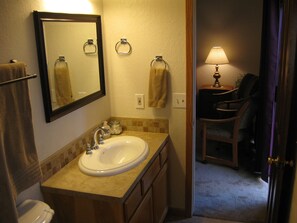 Combined shower/bathtub, hair dryer, towels, soap