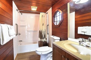 Combined shower/tub, hair dryer, towels, soap