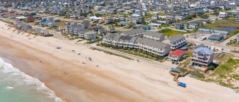 On the beach, sun-loungers