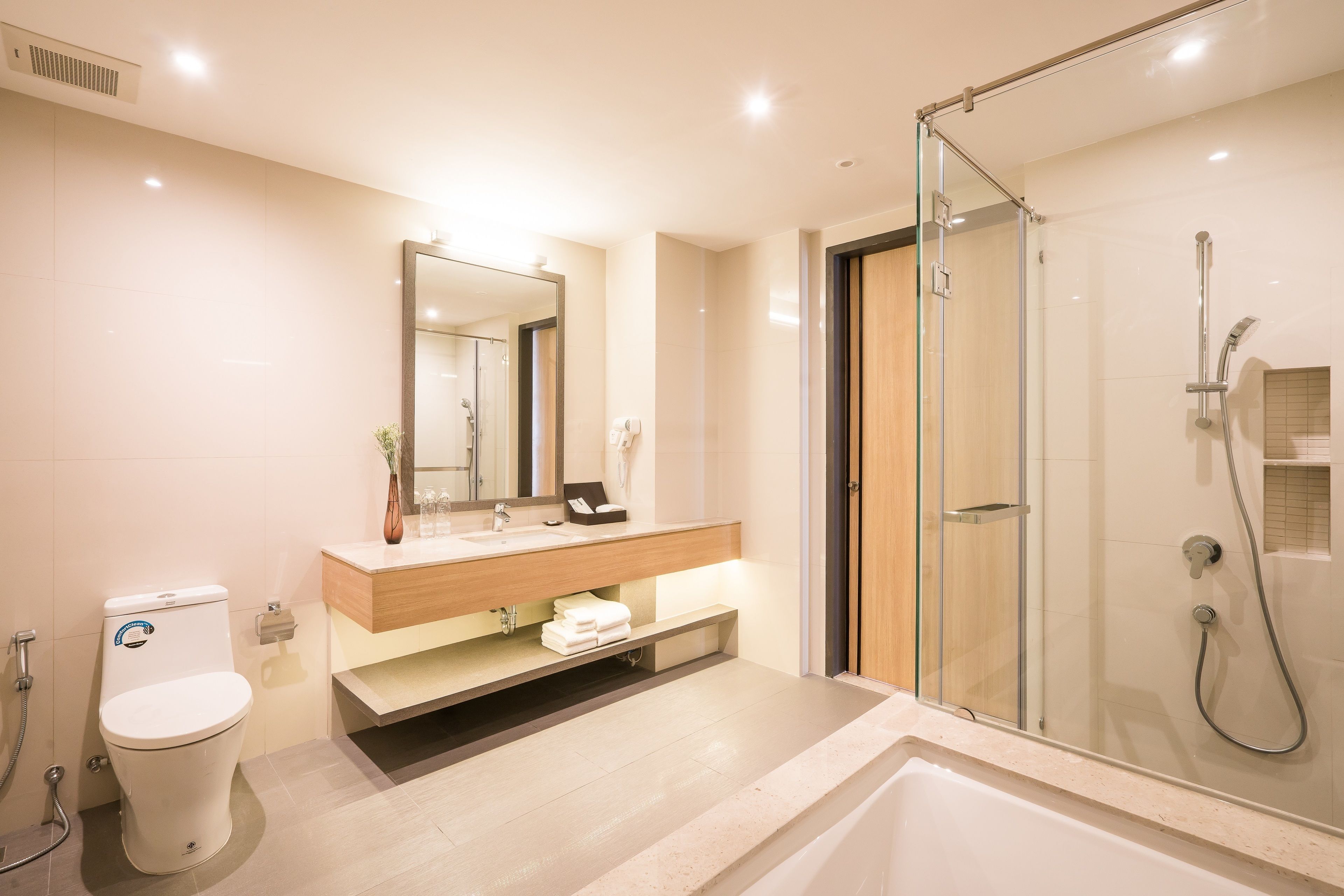 free toiletries, hair dryer, slippers, bidet