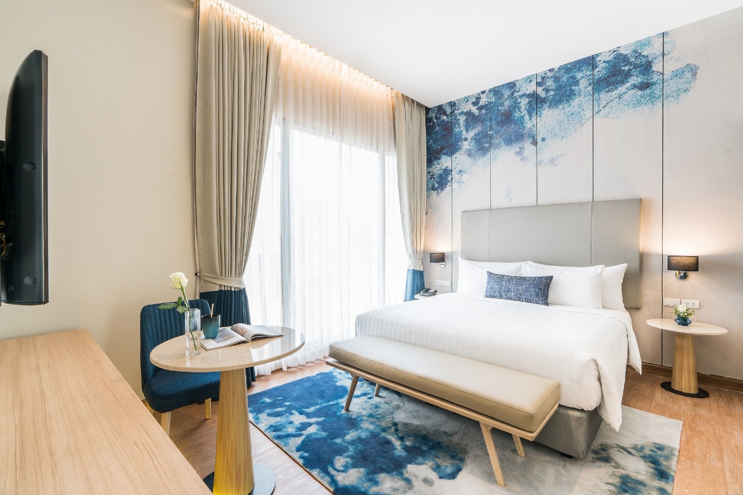 premier suite | in-room safe, desk, laptop workspace, blackout curtains