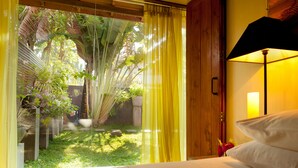 Habitación estándar con 1 cama matrimonial o 2 individuales, vista al jardín | Vista al jardín