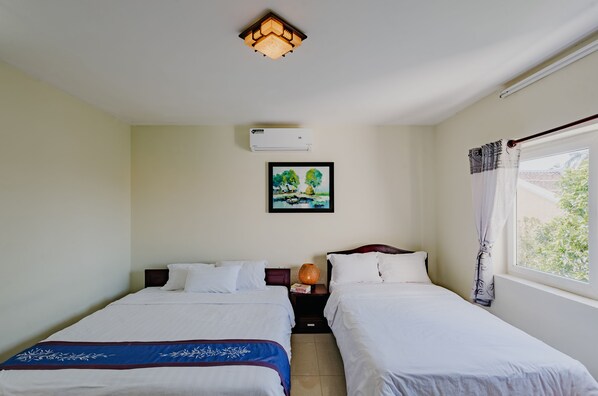 Kamar Keluarga | Minibar, meja kerja, tirai kedap cahaya, dan tempat tidur lipat/tambahan