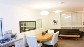Classic Apartment, Multiple Beds, Non Smoking | Living area | TV