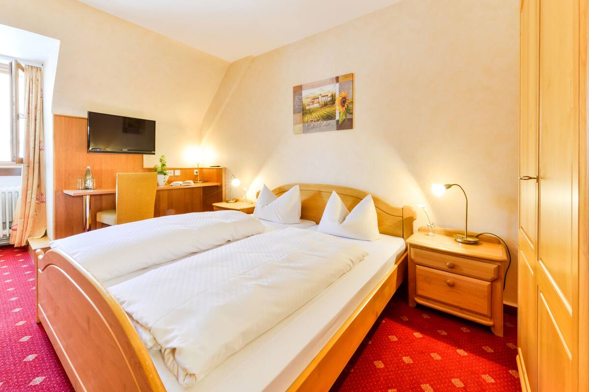 Een kluis op de kamer, gratis wifi, beddengoed