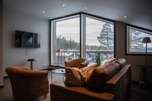 Deluxe-Suite, Mehrere Betten | Wohnbereich