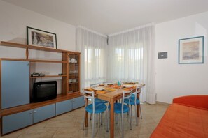Apartment, 1 Bedroom | Living area | TV