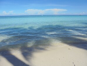 Beach nearby, white sand, beach cabanas, beach volleyball