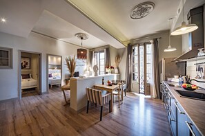 Superior Apartment, Balcony | Living area | TV - Habitat Apartments Alaia (Barcelona)