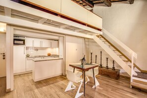 Loft, City View | In-room dining