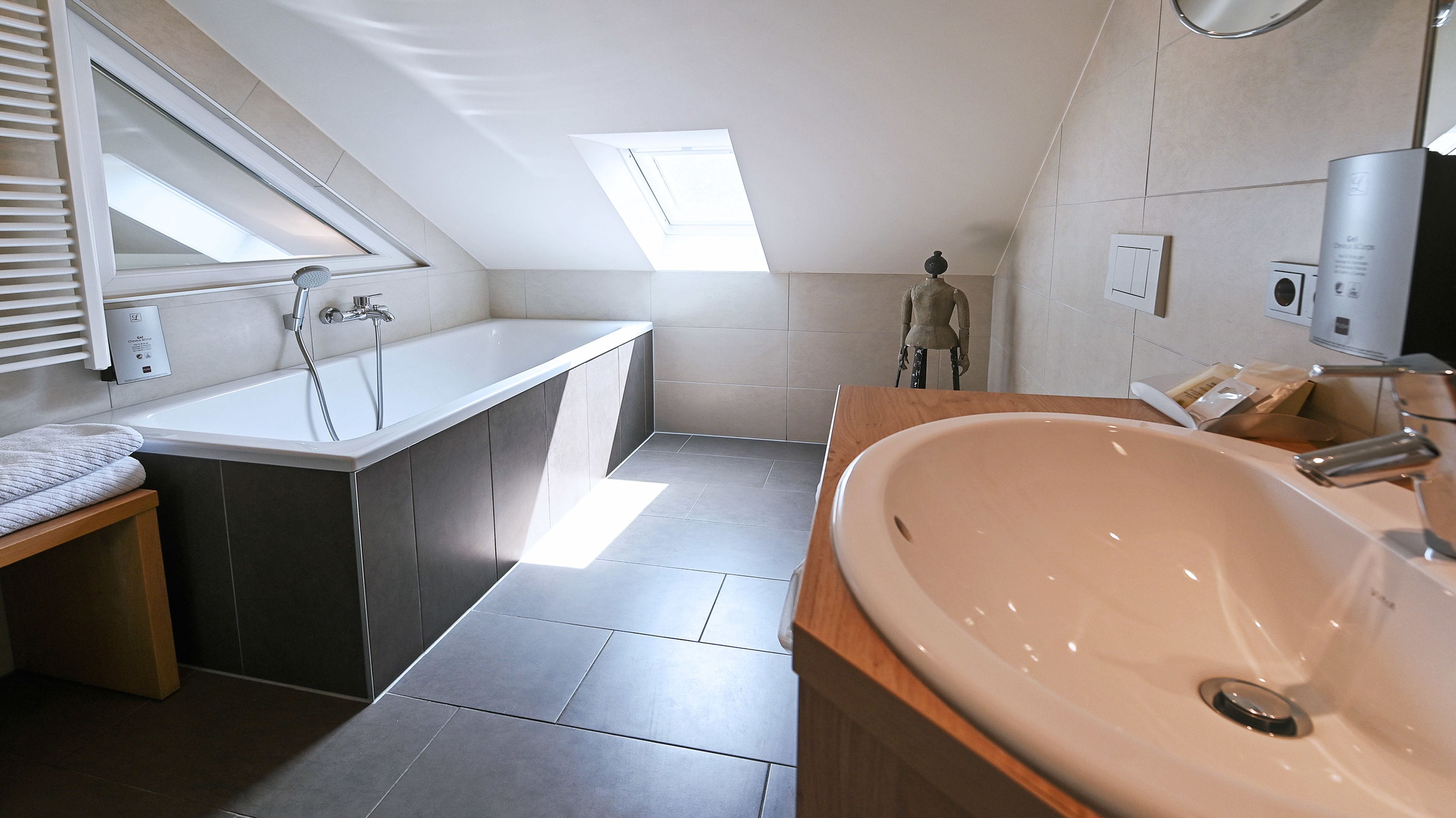 comfort suite | bathroom | shower, hair dryer, towels