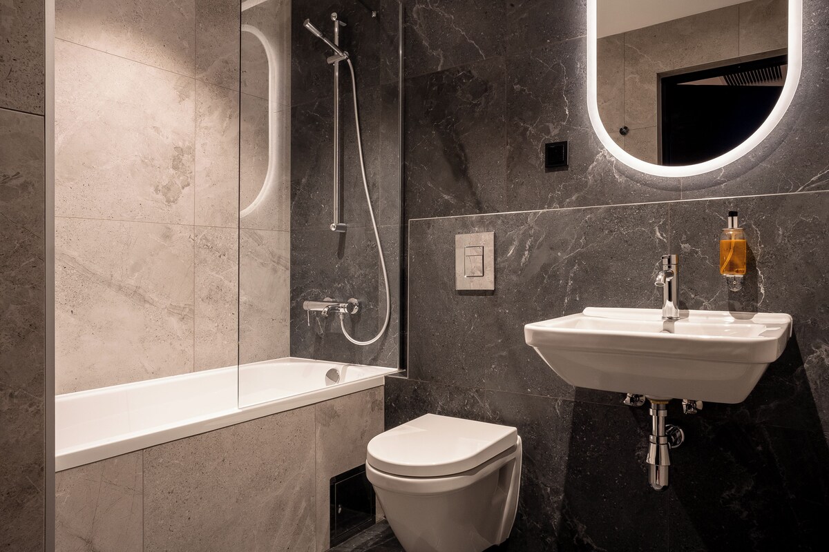 Bathroom | Separate bathtub and shower, deep-soaking bathtub, rainfall showerhead
