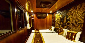 Habitació triple Deluxe, vistes al mar | Roba de llit 