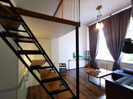 Tabla de planchar con plancha, wifi gratis y ropa de cama 