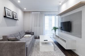 Apartament Deluxe | Sala d'estar | Televisor LED i Netflix 