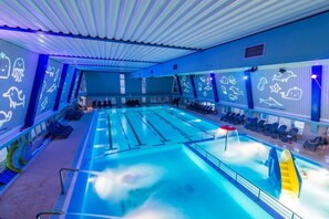 Indoor pool, open 9 AM to 9 PM, pool loungers