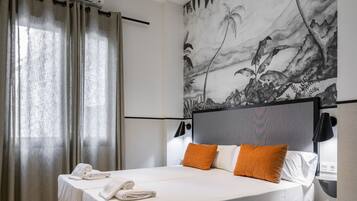 Estudi bàsic, 2 llits individuals (patio andaluz) | 2 dormitoris, roba de llit d'alta qualitat i cobrellits