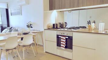 Apartment, 2 Bedrooms | Private kitchen | Full-size fridge, microwave, oven, stovetop