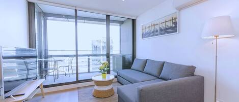 Apartment, 2 Bedrooms | Living area | Smart TV