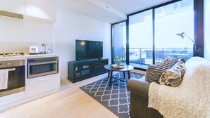 Apartemen, 2 kamar tidur | Area keluarga | Smart TV