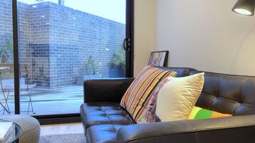 Apartment, 2 Bedrooms | Living area | Smart TV