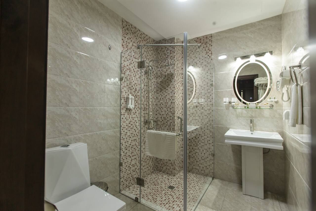 family double or twin room | bathroom | shower, free toiletries, hair dryer, bathrobes