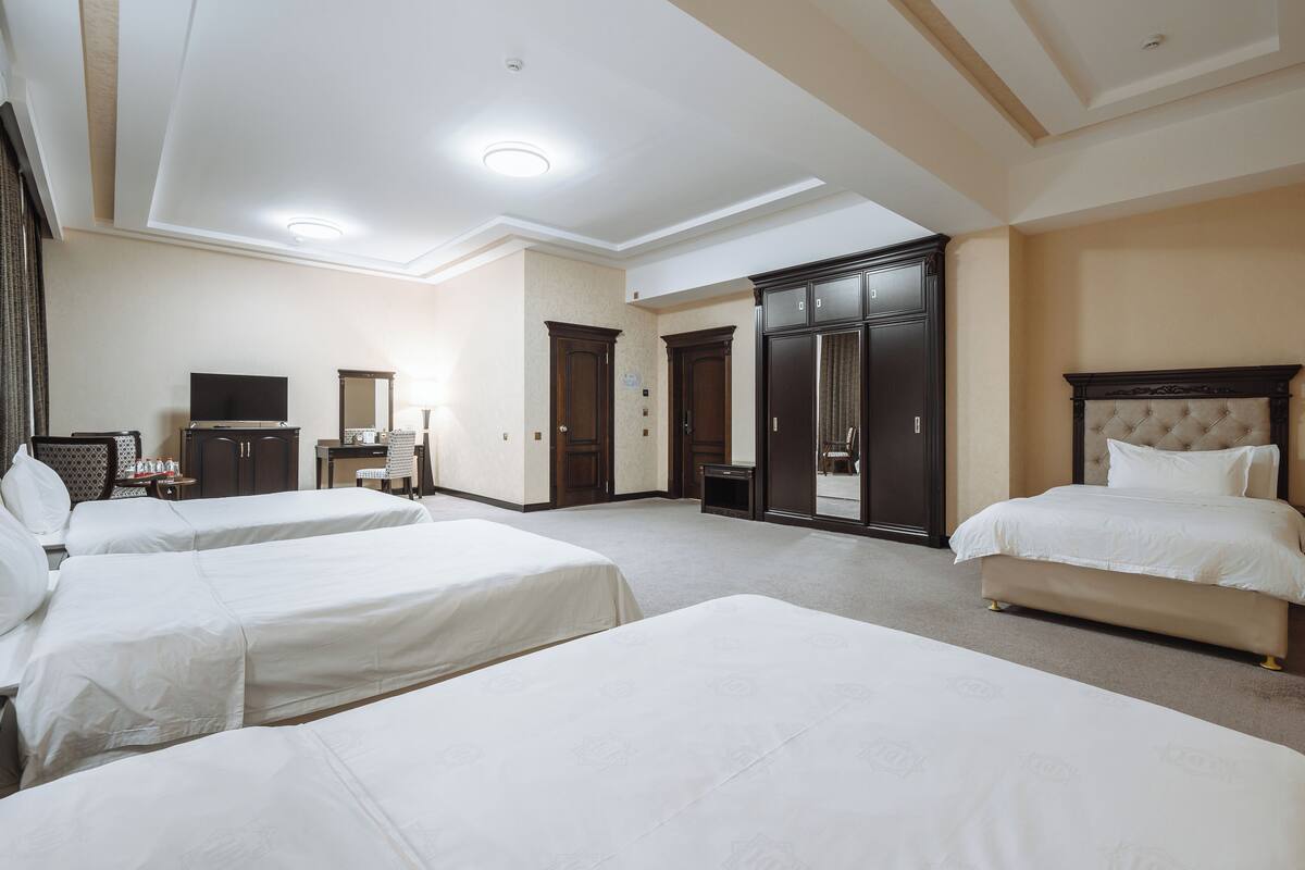 standard quadruple room | premium bedding, minibar, in-room safe, desk