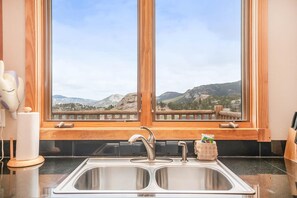 Condo, 2 Bedrooms | Private kitchen | Microwave, dishwasher, highchair, cookware/dishes/utensils - Teepee Mountain 12a 2 Bedroom Condo by RedAwning (Estes Park)