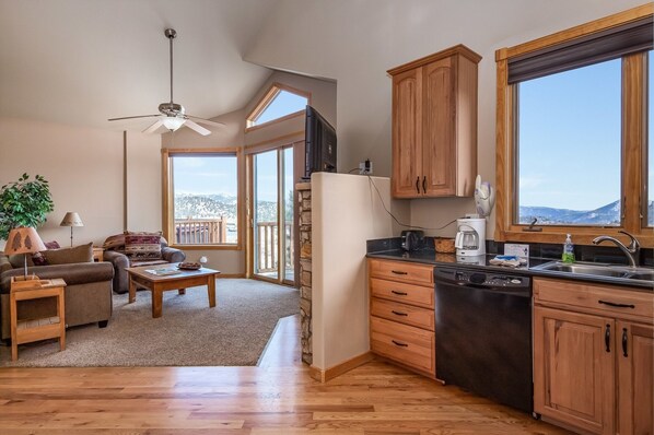 Condo, 2 Bedrooms | Private kitchen | Microwave, dishwasher, highchair, cookware/dishes/utensils