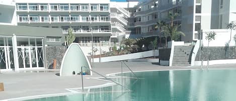 3 outdoor pools, open 10 AM to 6:30 PM, pool umbrellas, pool loungers