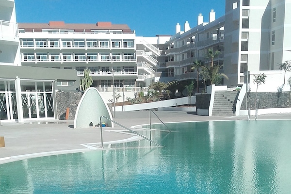 3 outdoor pools, open 10 AM to 6:30 PM, pool umbrellas, pool loungers